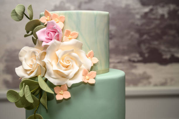 Beautiful homemade wedding cake decorated with fresh flowers